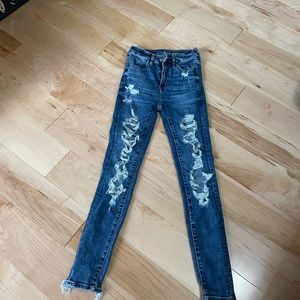 American Eagle next level stretch ripped jeans